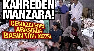 Yürek yakan anlar! Cenazelerin arasında toplantısı düzenlediler